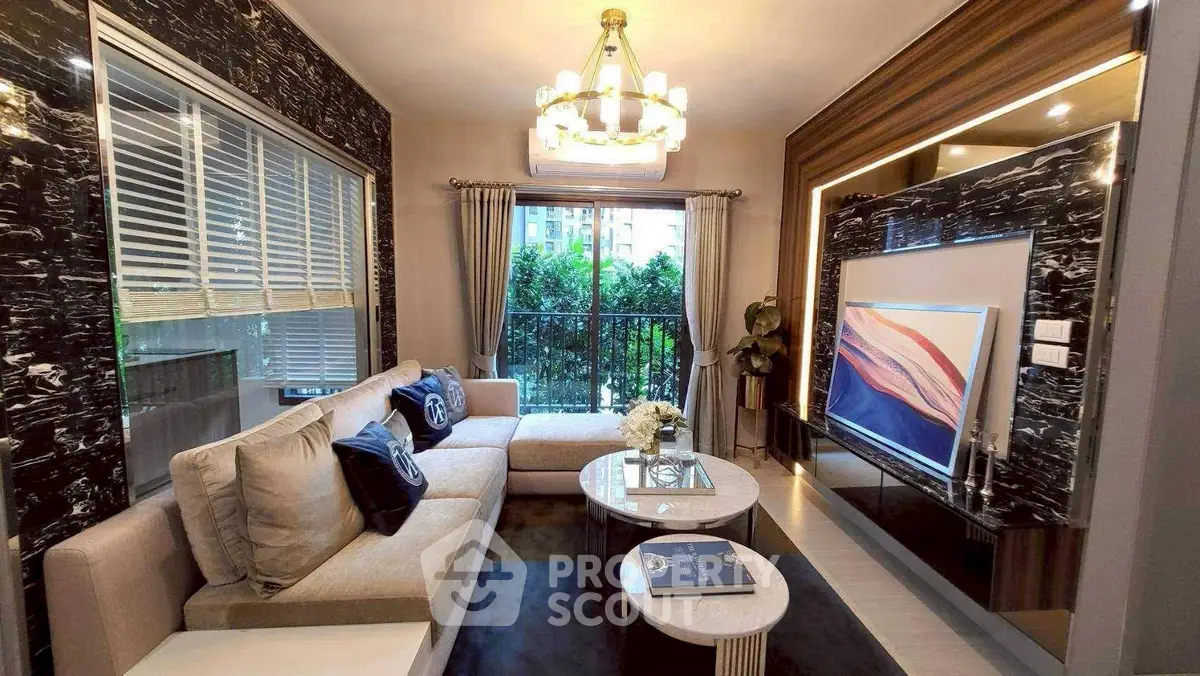 Luxurious living room with elegant decor and balcony view