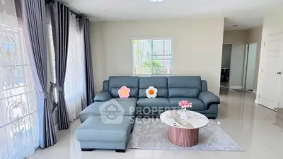 Modern living room with stylish gray sofa and elegant decor
