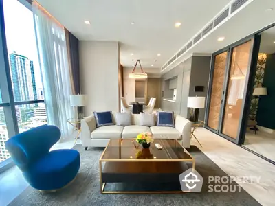 Chic and modern living room with plush seating, elegant decor, and floor-to-ceiling windows offering an urban view, perfect for upscale city living.