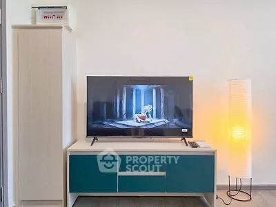 Modern living room with stylish TV stand and ambient lighting