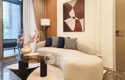 Stylish modern living room with elegant sofa and artistic decor