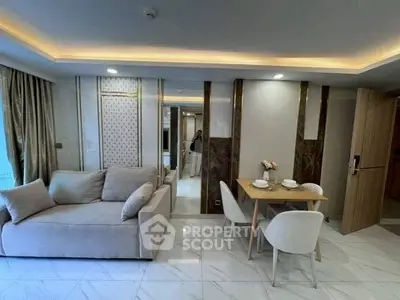 Modern living room with elegant sofa and dining area in luxury apartment