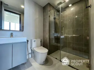 Modern bathroom with sleek shower and contemporary fixtures