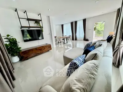 Spacious modern living room with elegant decor and natural light