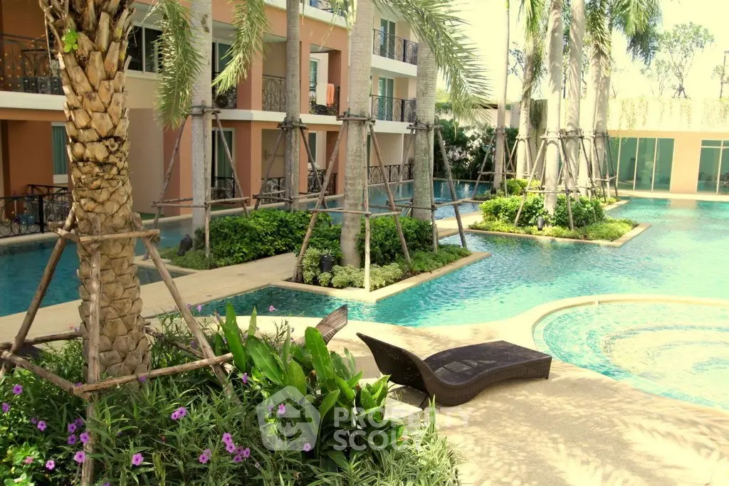Luxurious resort-style pool area with lush landscaping and modern architecture.