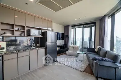 Modern open-layout living room with kitchen and city view balcony in luxury apartment.