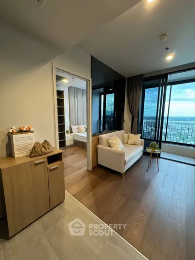 Modern living room with stunning city view and elegant decor