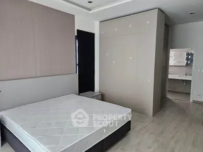 Spacious bedroom with modern design and ensuite bathroom