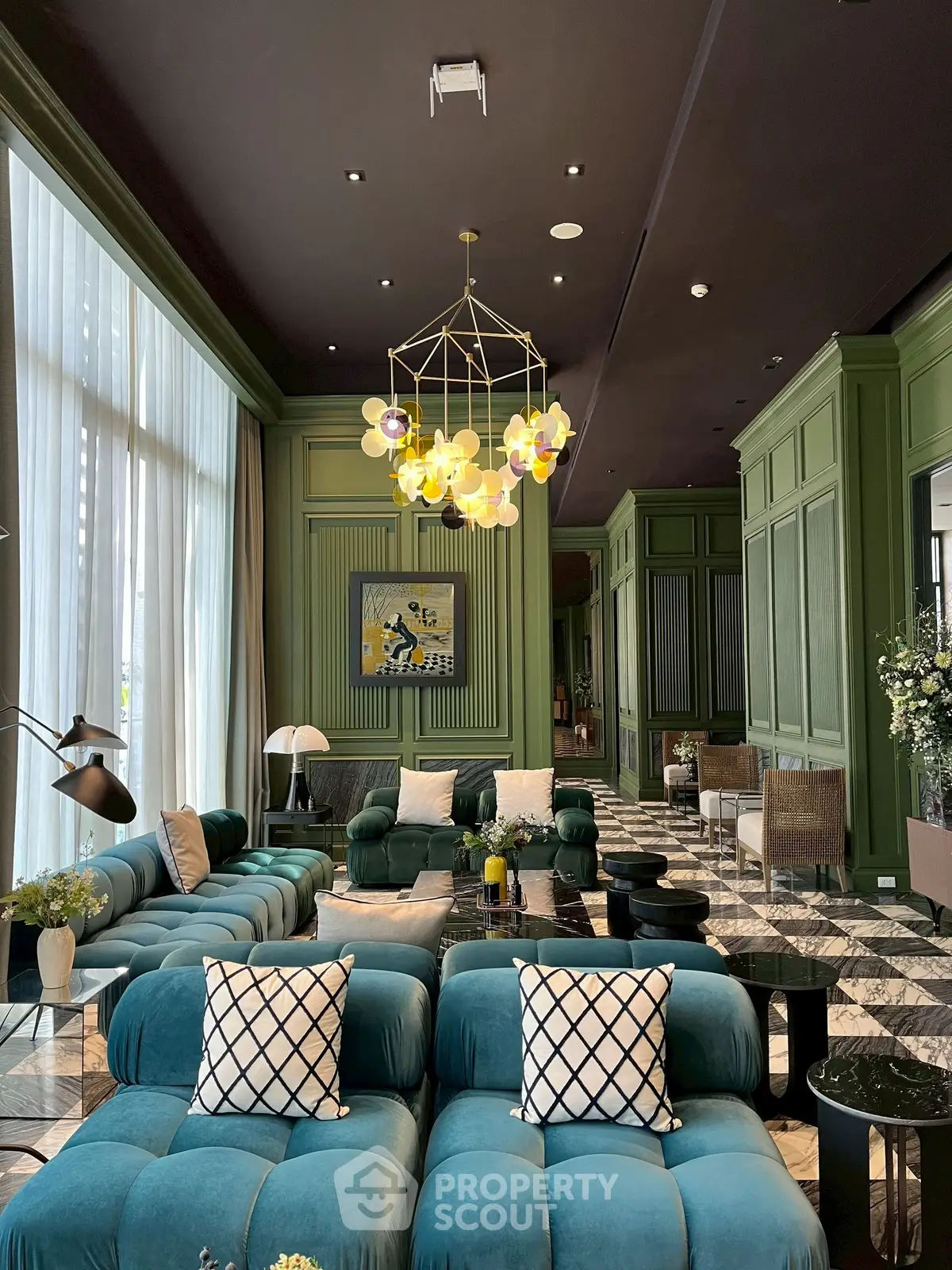 Luxurious living room with elegant decor and plush seating in a modern apartment.