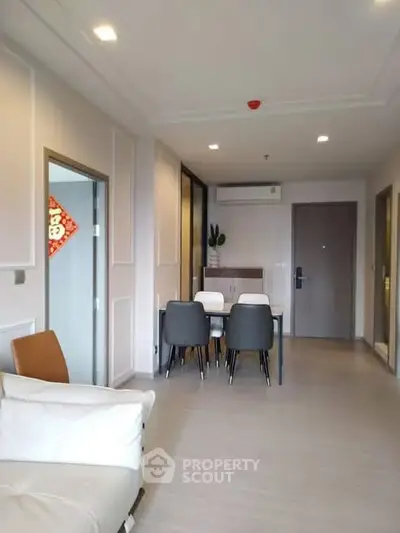 Modern living room with dining area and stylish decor