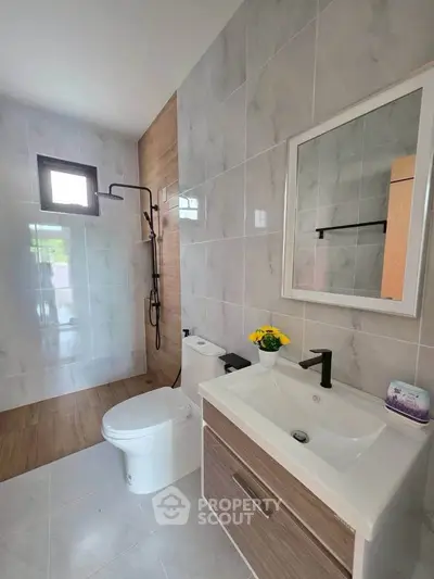 Modern bathroom with sleek fixtures and elegant tile design