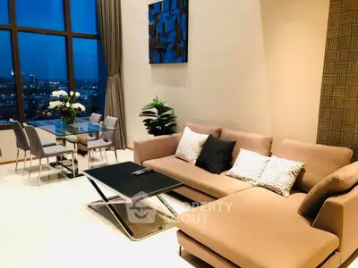 Luxurious living room with modern decor and stunning city view