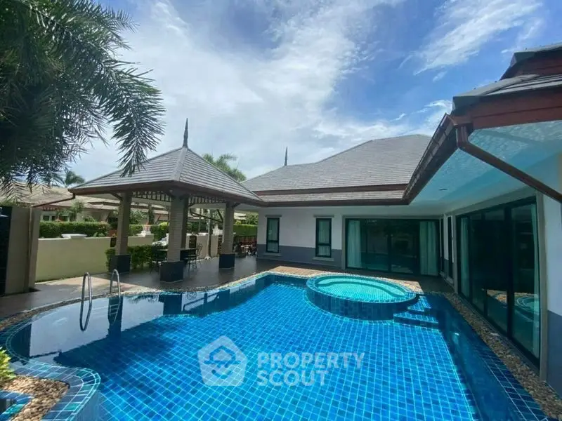 Luxurious villa with private pool and gazebo, perfect for tropical living.