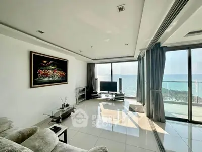 Luxurious living room with stunning ocean view and modern decor