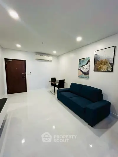 Modern living room with sleek sofa and minimalist decor