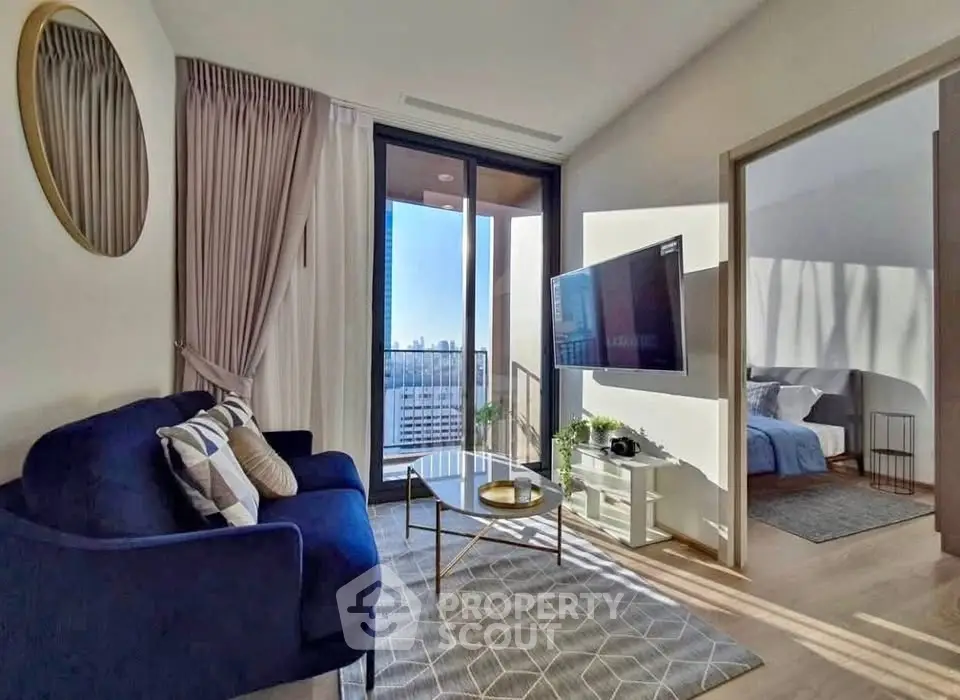 Modern living room with balcony view and stylish decor in urban apartment