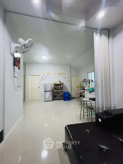 Spacious modern living area with sleek design and ample natural light