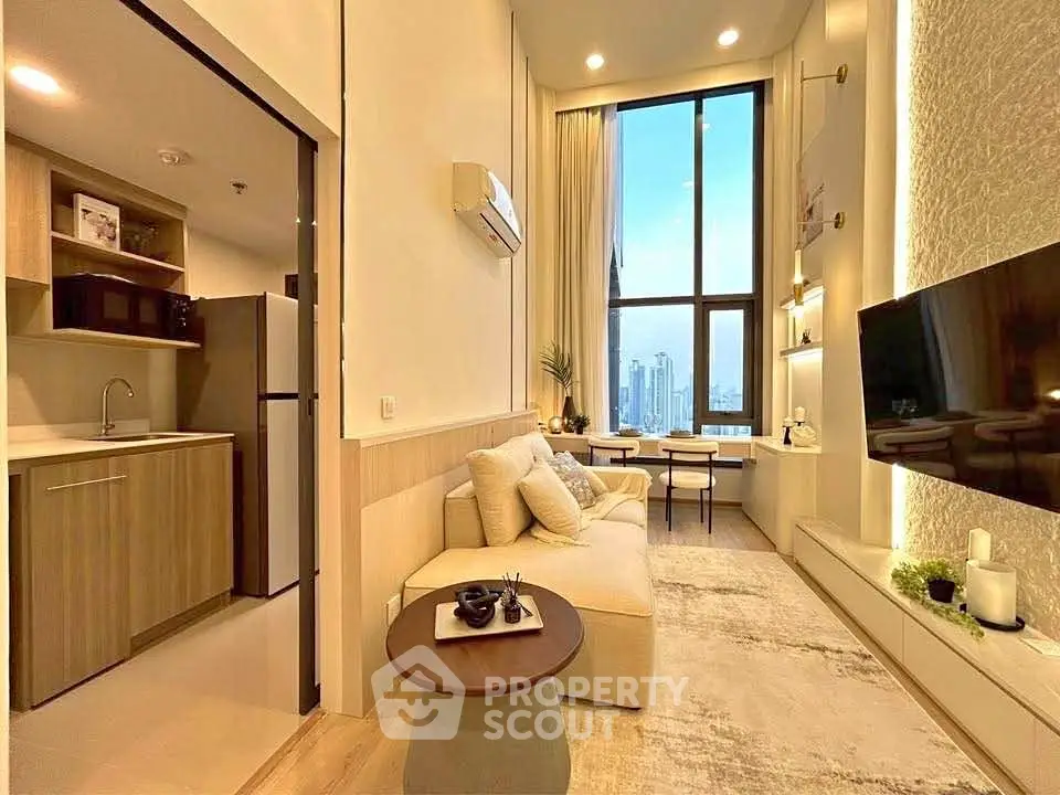 Luxurious high-ceiling living room with city view, modern decor, and open kitchen layout.
