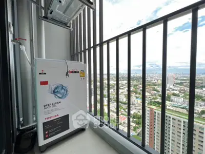 High-rise balcony with washing machine and panoramic city view