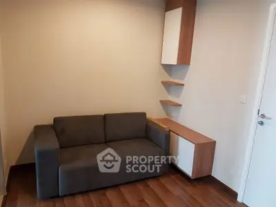 Cozy living room with modern sofa and wooden flooring