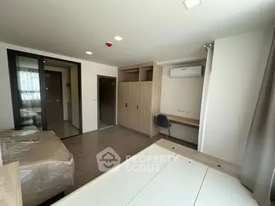 Modern bedroom with sleek design and built-in storage solutions