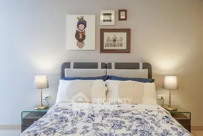 Cozy bedroom with stylish decor and elegant lighting