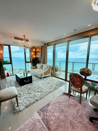 Luxurious living room with stunning ocean view and elegant decor