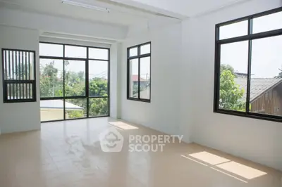 Spacious corner unit with large windows offering abundant natural light and scenic views.