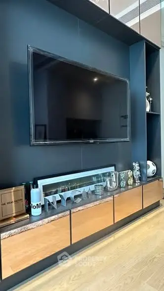 Modern living room with sleek TV unit and stylish decor accents