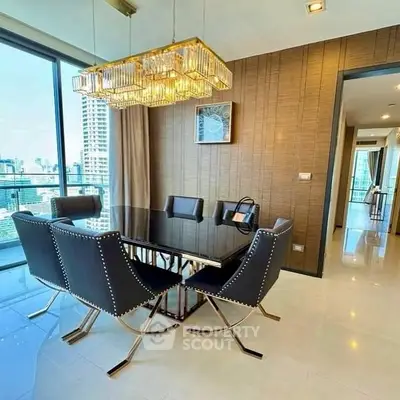 Luxurious dining room with city view, elegant chandelier, and modern furniture