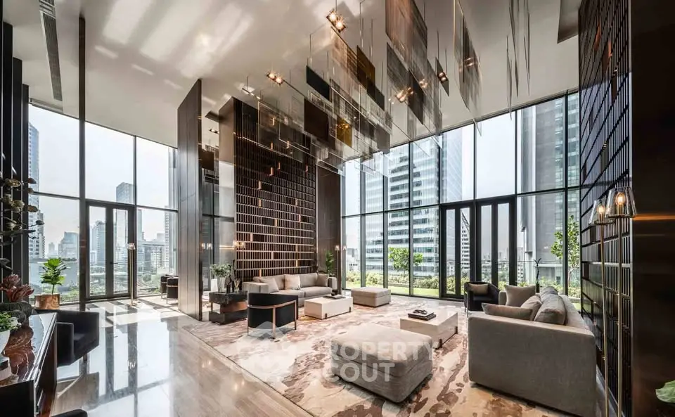 Luxurious modern living room with floor-to-ceiling windows and city skyline view.