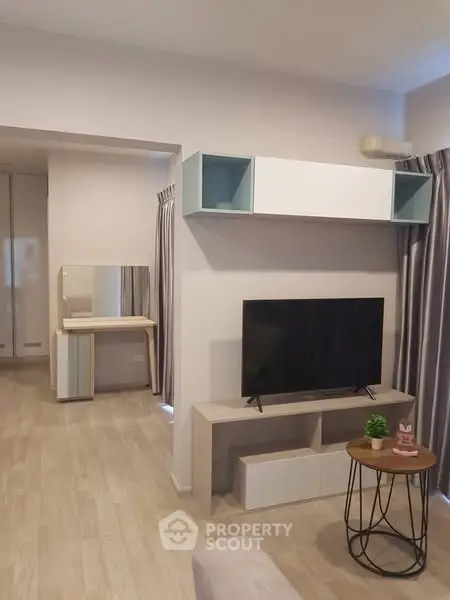 Modern living room with sleek TV stand and stylish decor