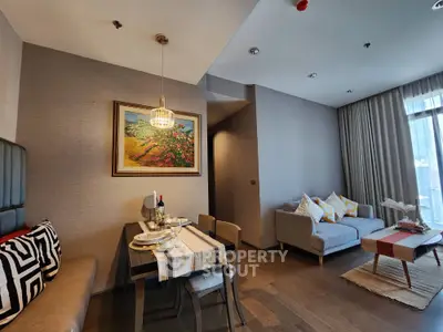 Modern living room with dining area, stylish decor, and natural light