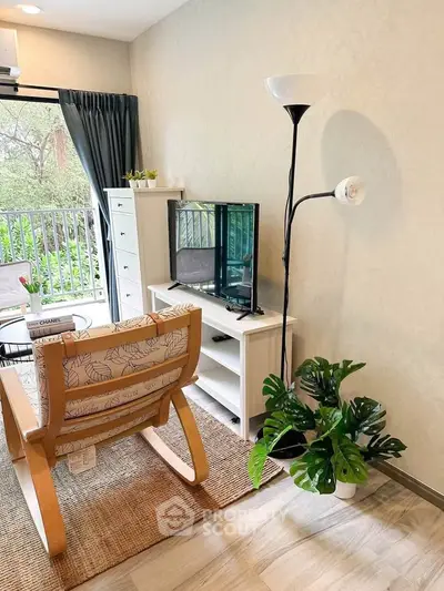 Cozy living room with modern decor and balcony view