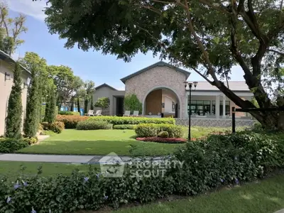 Luxurious garden view of modern property with lush landscaping and elegant architecture.