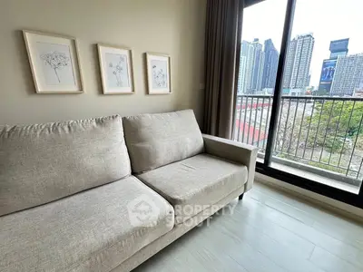Modern living room with cozy sofa and city view balcony in urban apartment