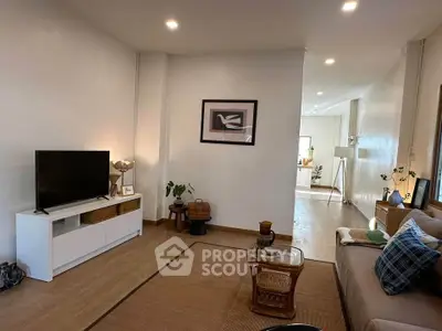 Cozy living room with modern decor and natural lighting