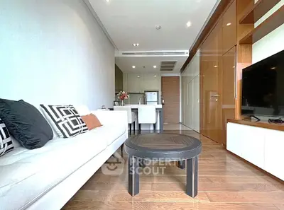 Modern living room with sleek design, open layout, and stylish furniture in a contemporary apartment.
