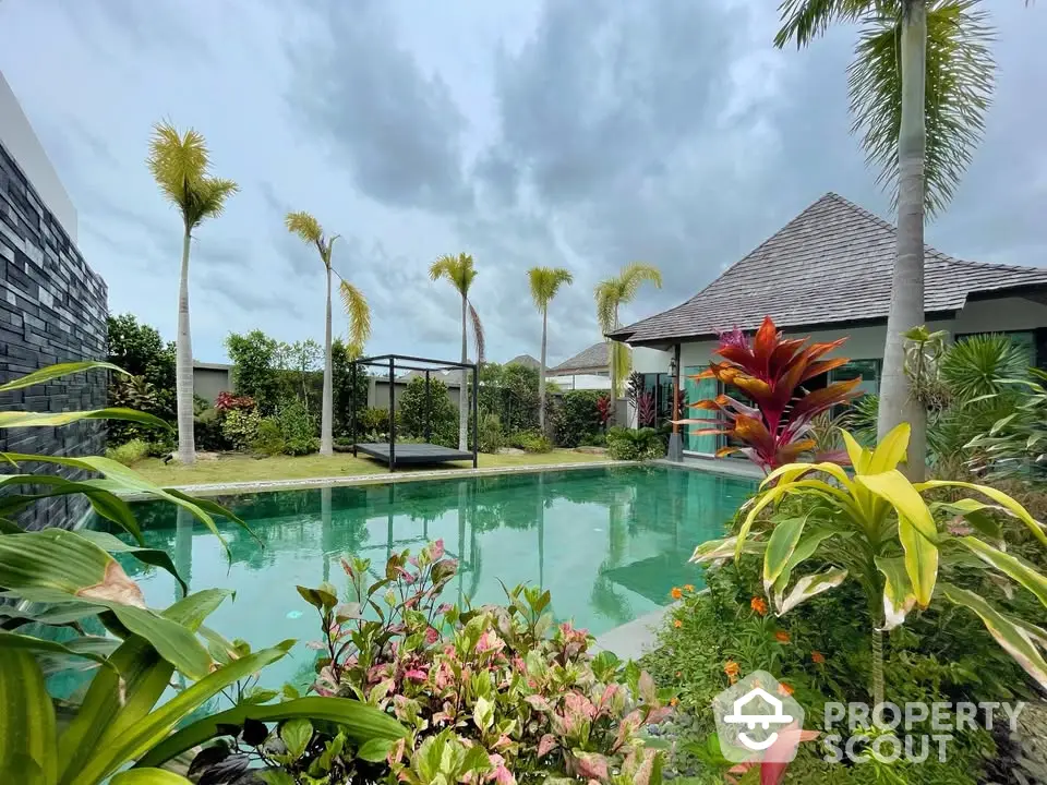 Luxurious tropical villa with private pool and lush garden, perfect for serene living.