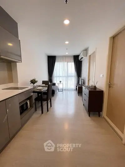 Modern living room with open kitchen in a stylish apartment