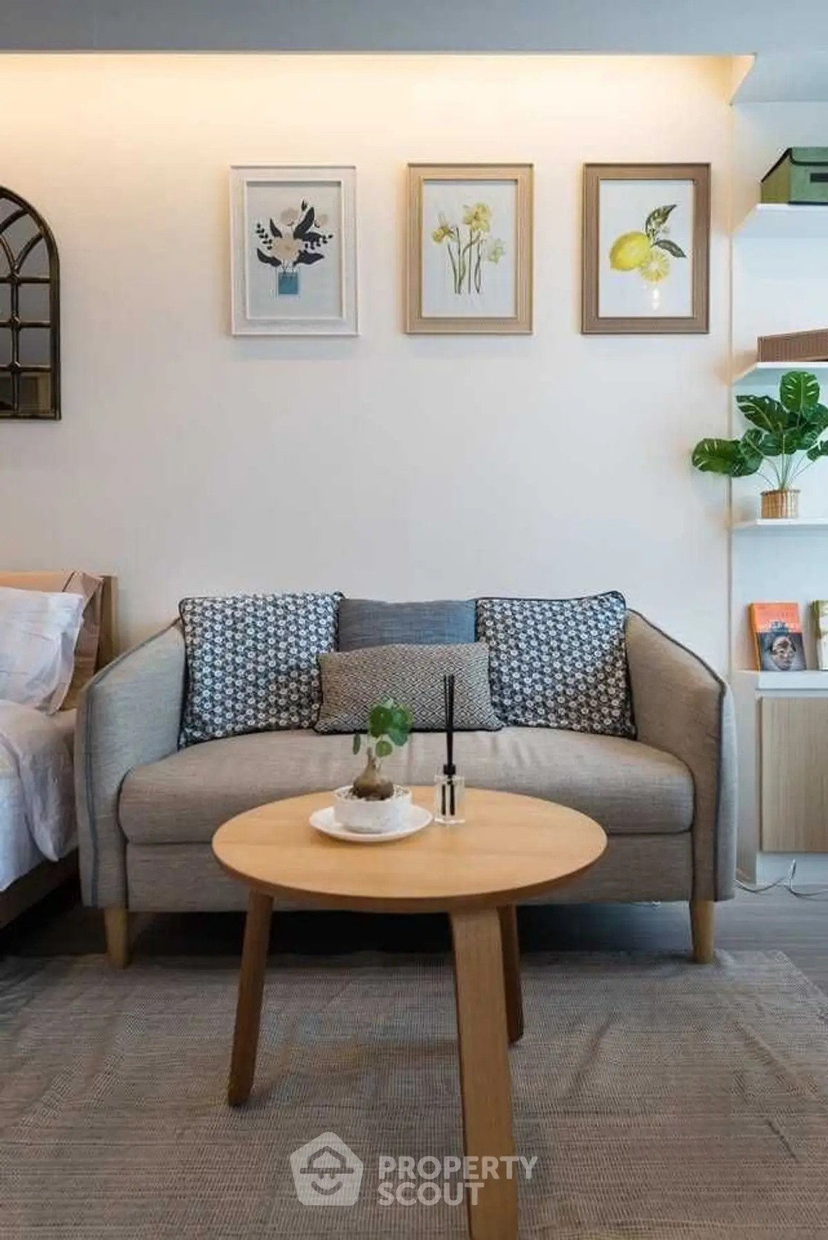 Charming living room with cozy sofa and stylish decor