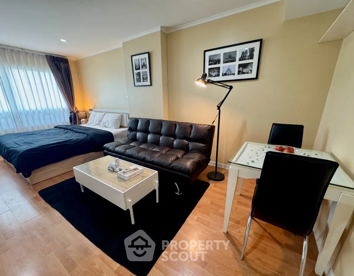 Spacious studio apartment with modern furnishings and natural light