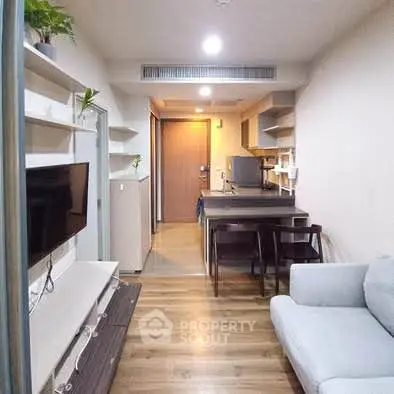 Modern living room with sleek furniture and open layout