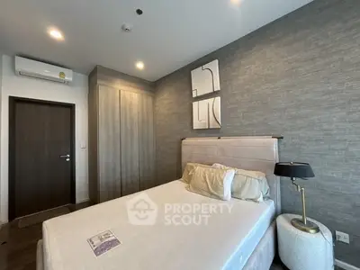 Modern bedroom with stylish decor and cozy ambiance