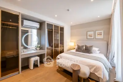 Luxurious bedroom with elegant decor, spacious wardrobe, and cozy lighting for ultimate comfort.