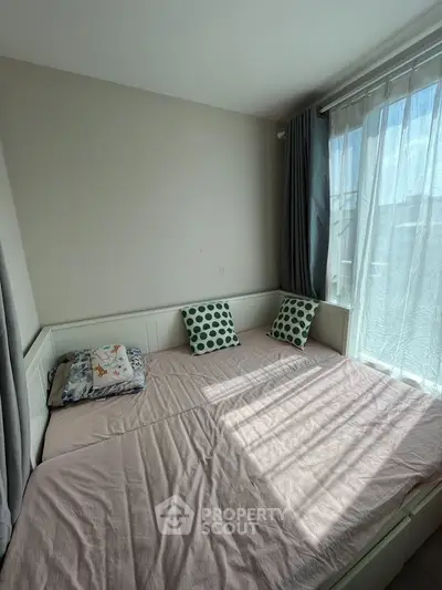 Cozy bedroom with natural light and stylish decor