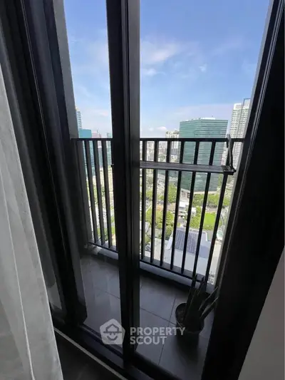 Modern balcony with city view and sleek railing design