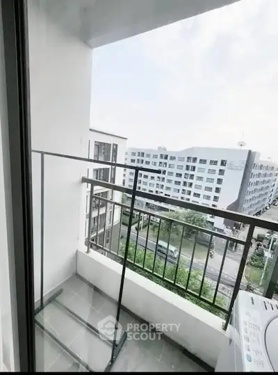 Cozy balcony with city view in modern apartment building