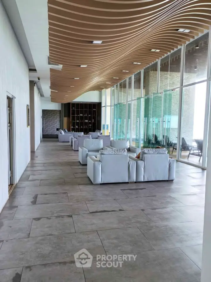 Luxurious modern living room with elegant design and spacious seating area.