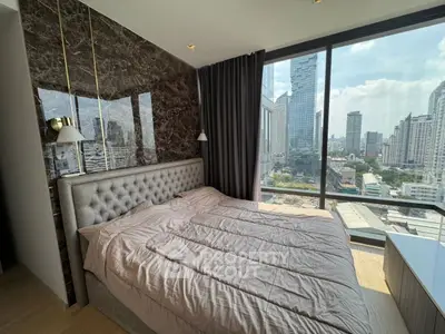 Luxurious bedroom with stunning city view and elegant decor